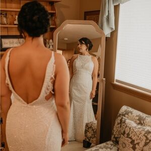 Hayley Paige Divine Size 12 with flattering open back design and custom skirt.